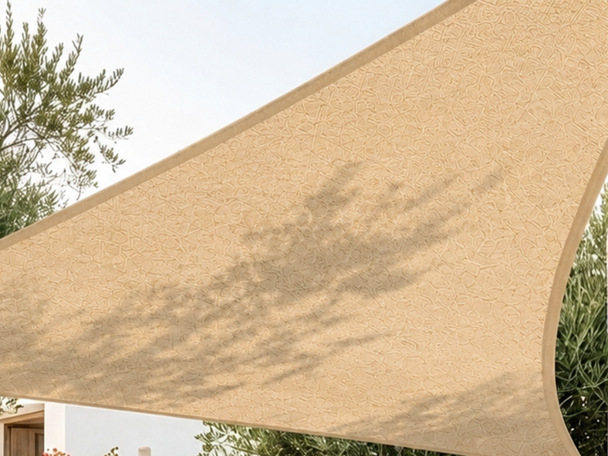 Breathable HDPE triangular shade sail seen from beneath